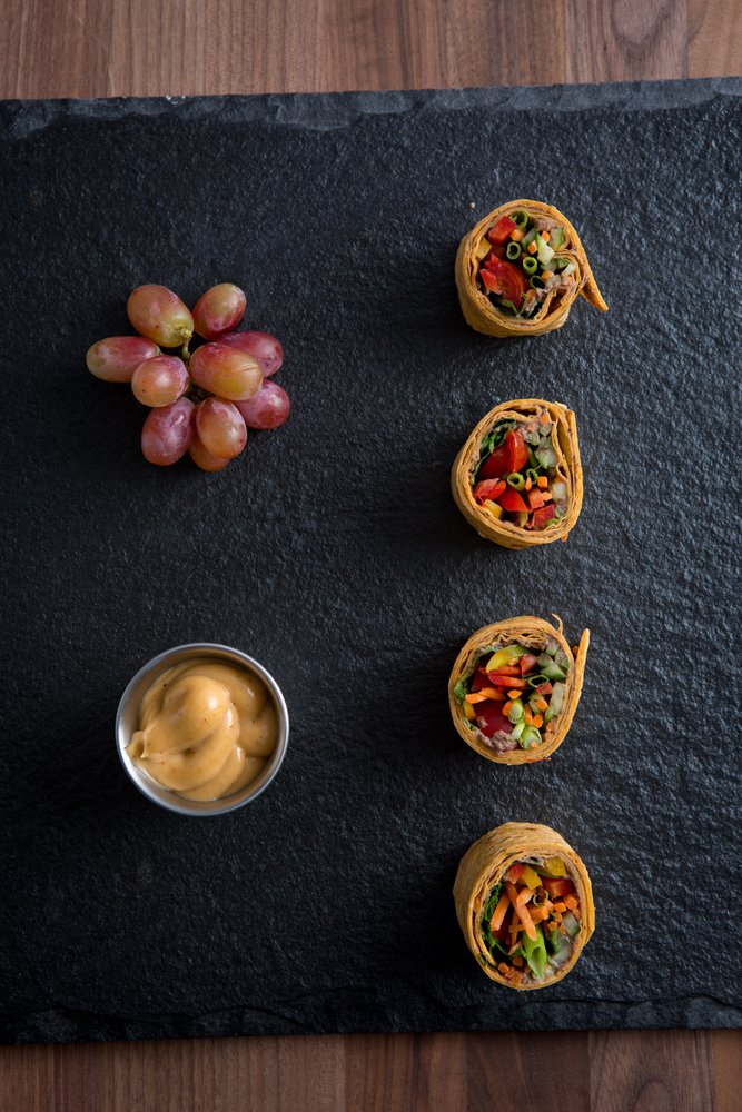 veggie wraps with black bean hummus and grapes