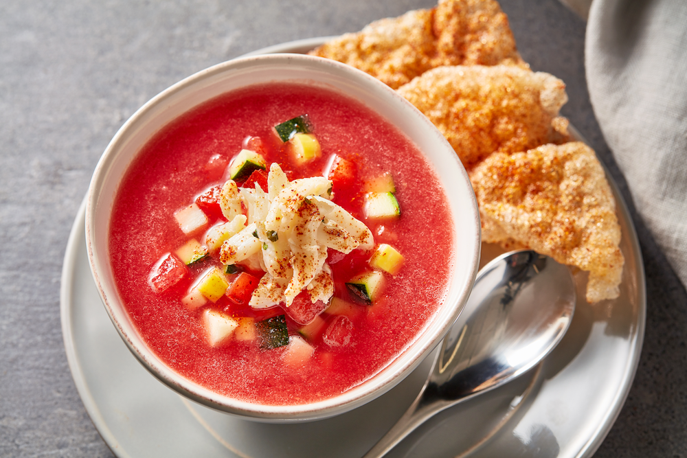 watermelon soup topped with crab salad